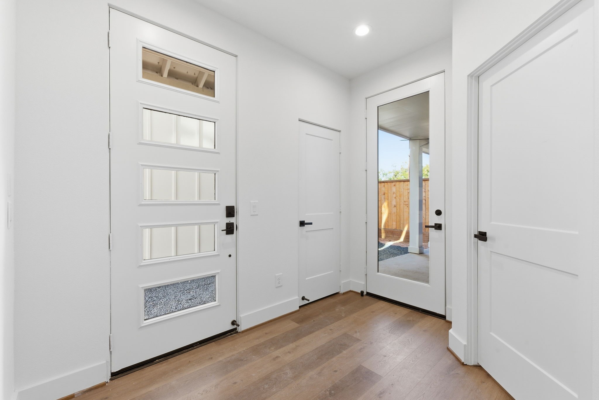 7706 Earl Rudder Way Houston, TX 77055 - Photo 9 of 46 an empty room with windows and closet