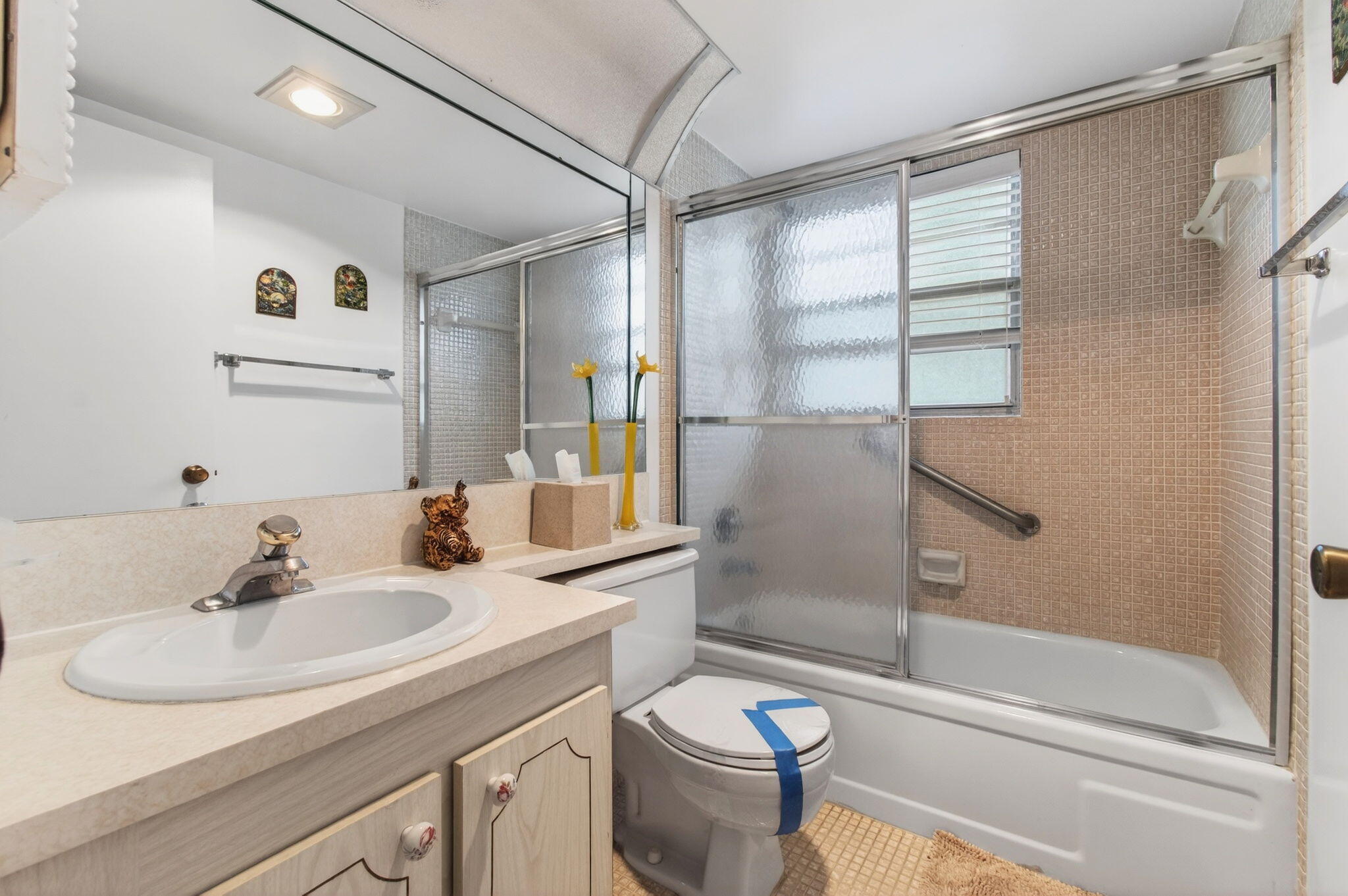 281 Dorset G Boca Raton, FL 33434 - Photo 24 of 85 a bathroom with a sink toilet and shower