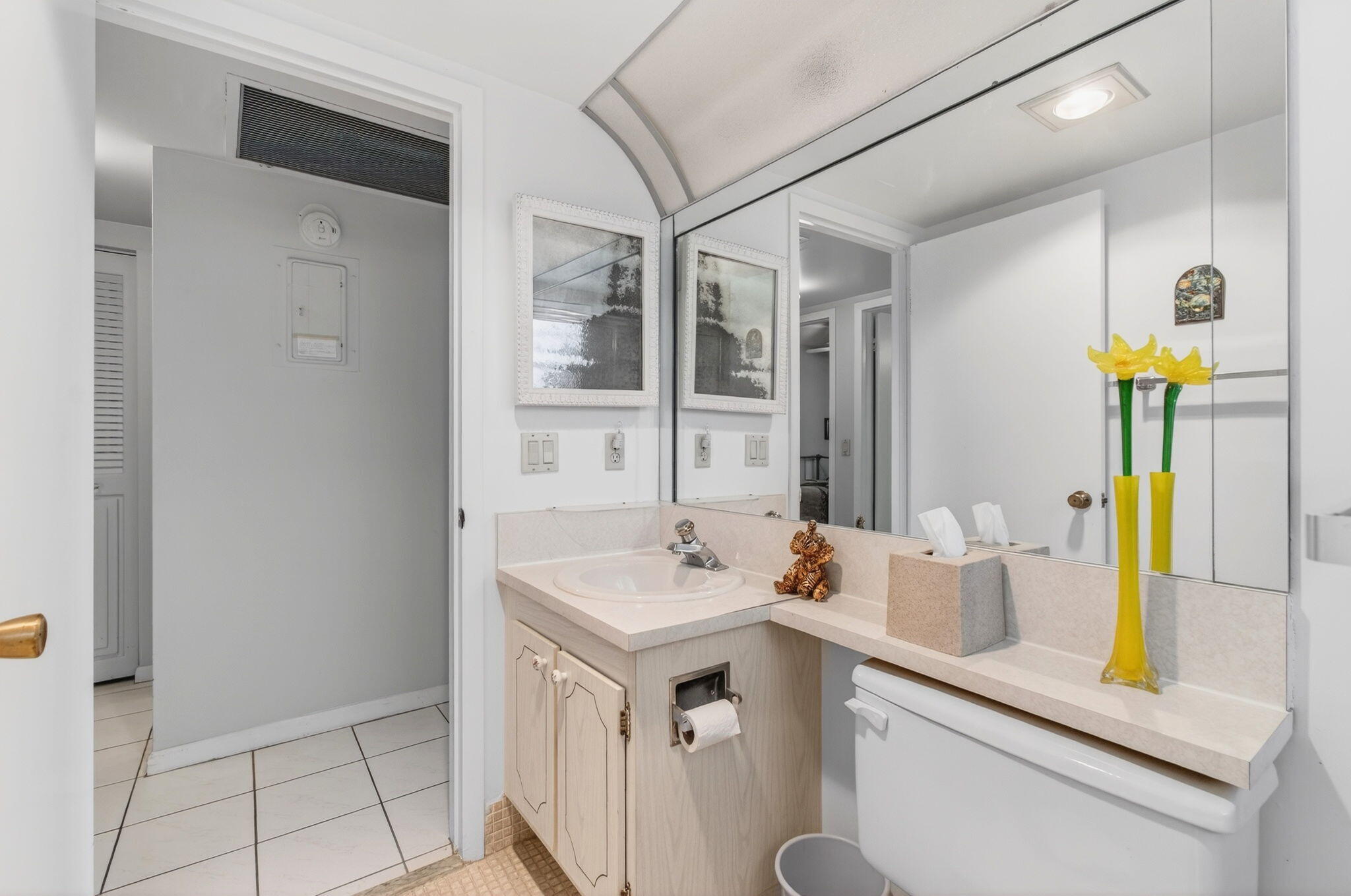 281 Dorset G Boca Raton, FL 33434 - Photo 26 of 85 a bathroom with a sink and a mirror