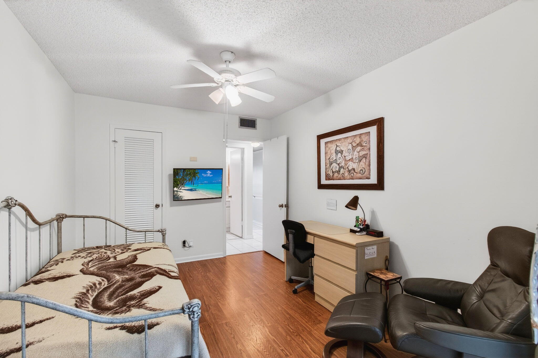 281 Dorset G Boca Raton, FL 33434 - Photo 32 of 85 a living room with furniture and a flat screen tv