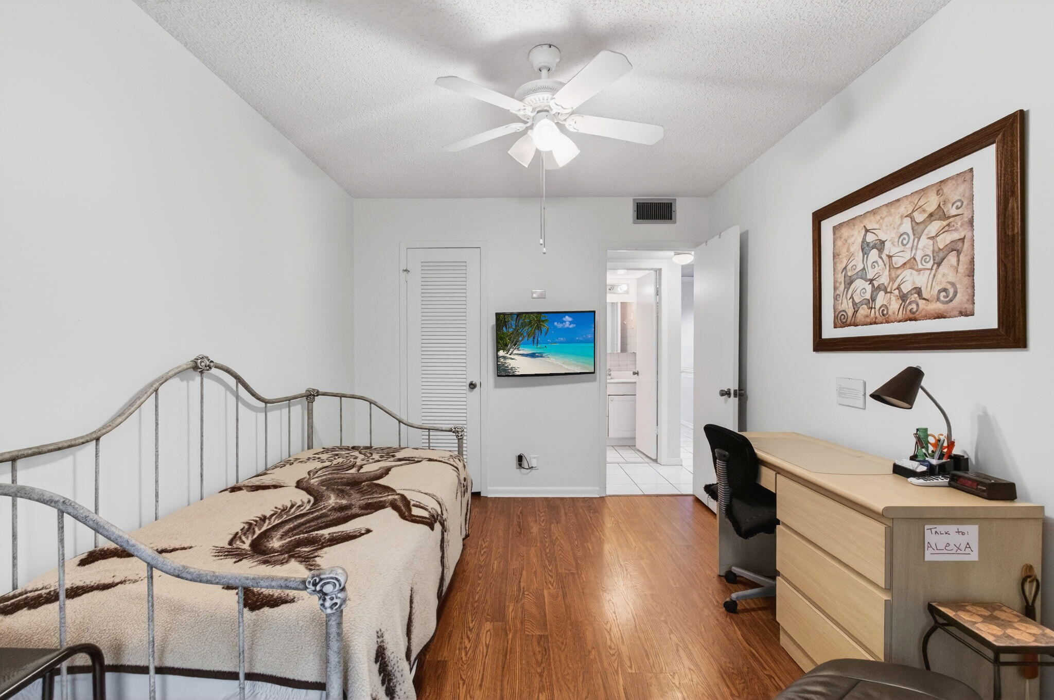 281 Dorset G Boca Raton, FL 33434 - Photo 33 of 85 a bedroom with furniture and a ceiling fan