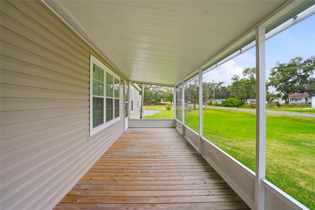 11305 Broadview Road Seffner, FL 33584 - Photo 8 of 34 a view of swimming pool with garden and patio