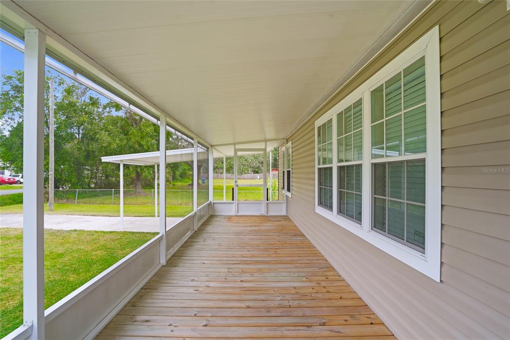 11305 Broadview Road Seffner, FL 33584 - Photo 9 of 34 a park with large windows and a table