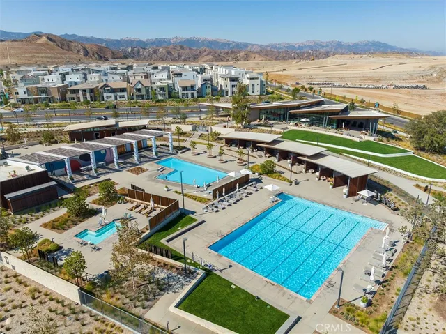 an aerial view of a house with a ocean view