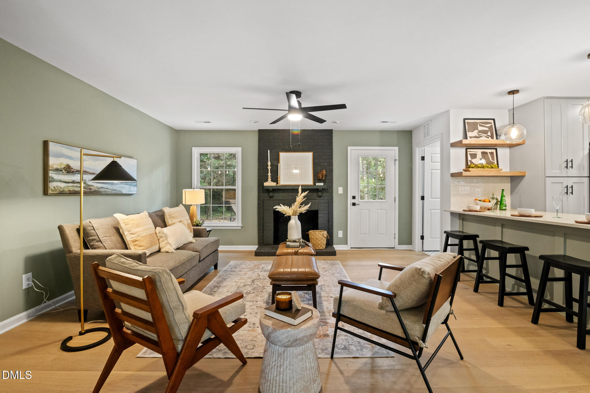 3509 Morningside Drive Raleigh, NC 27607 - Photo 11 of 49 a living room with furniture and a wooden floor