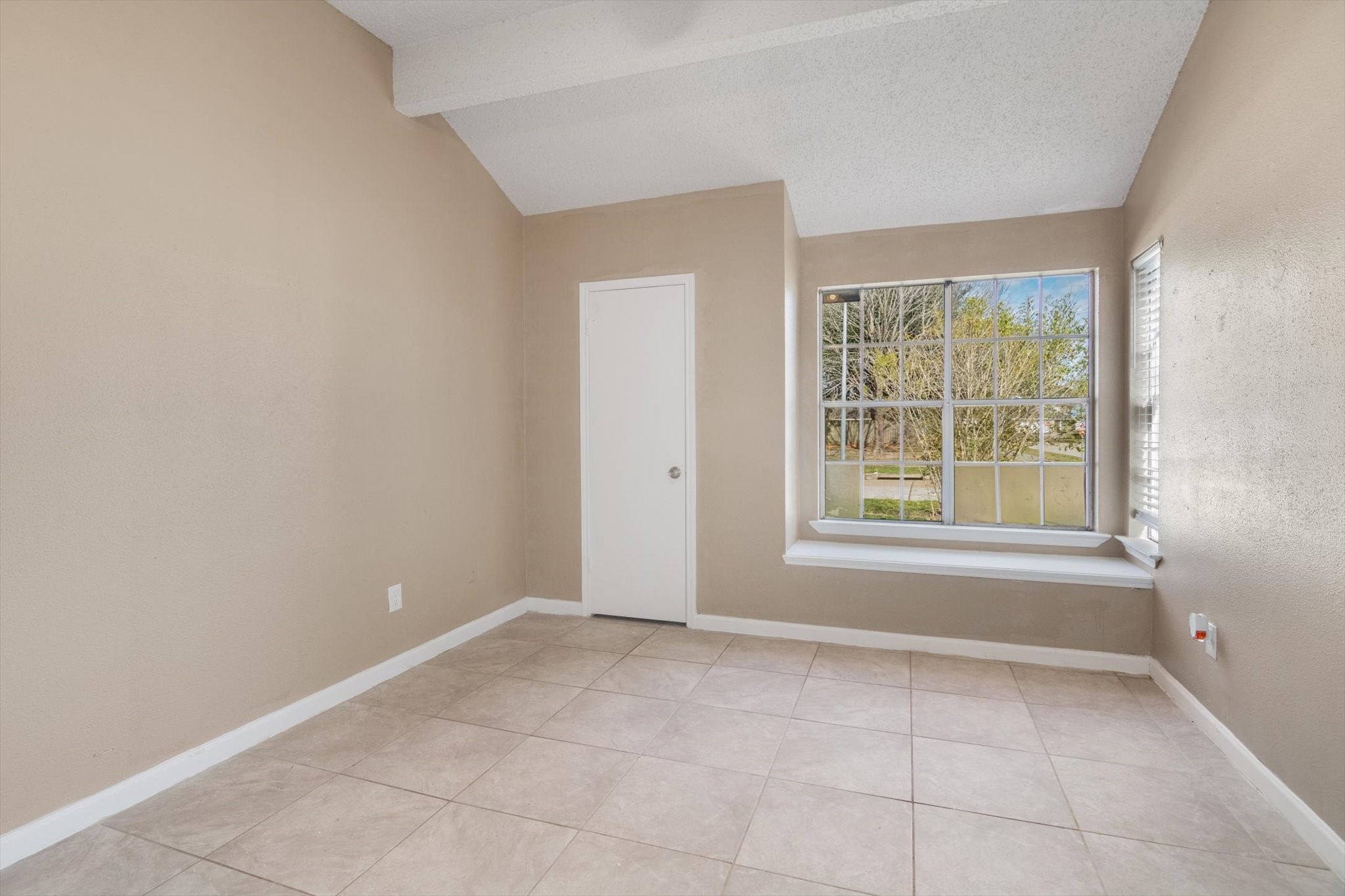 4403 Conward Drive Houston, TX 77066 - Photo 14 of 25 a view of an empty room with a window