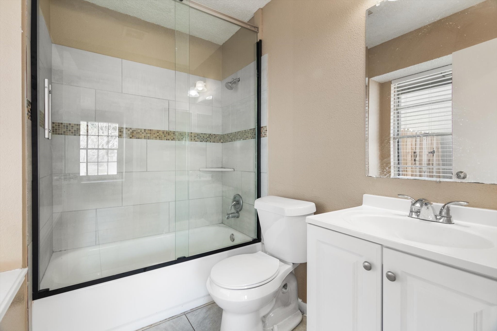 4403 Conward Drive Houston, TX 77066 - Photo 17 of 25 a bathroom with a sink toilet and shower