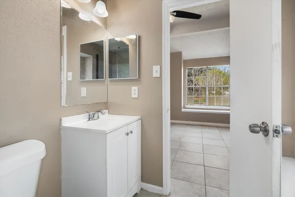 a view of a room that has a window in it