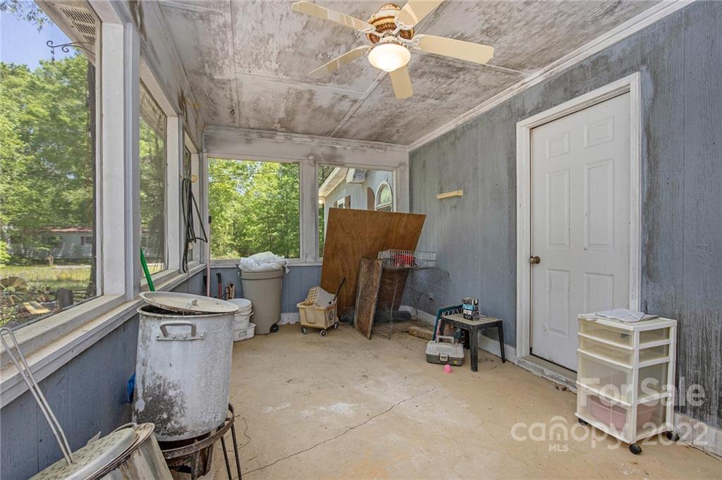 340 Sally Blackwell Road Pageland, SC 29728 - Photo 21 of 30 a view of a workspace with furniture and a window