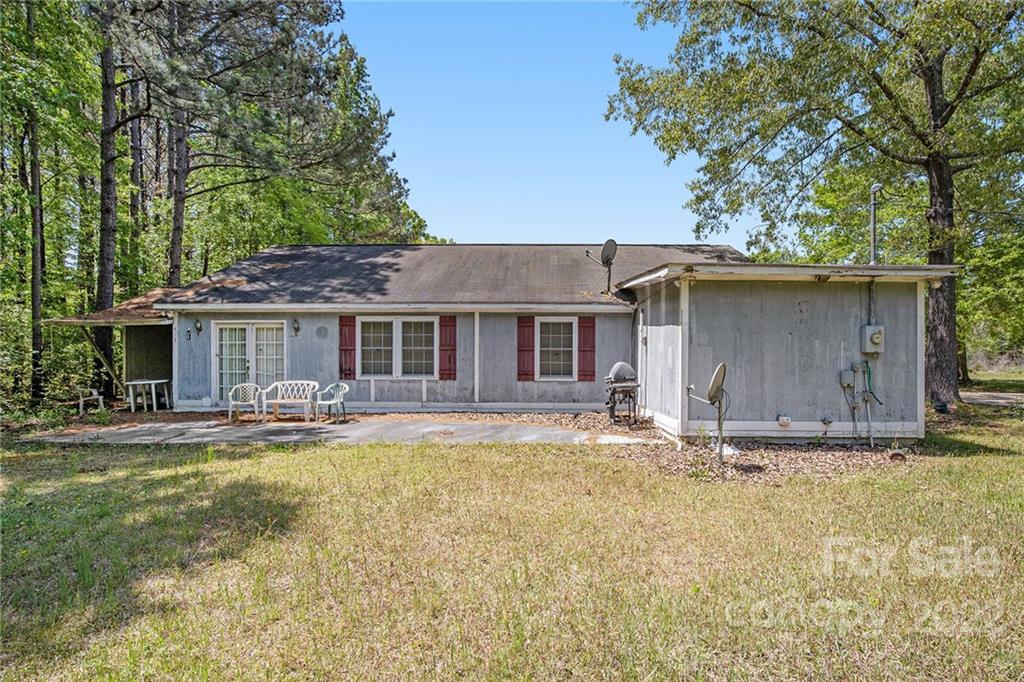 340 Sally Blackwell Road Pageland, SC 29728 - Photo 25 of 30 a front view of house with yard seating and green space