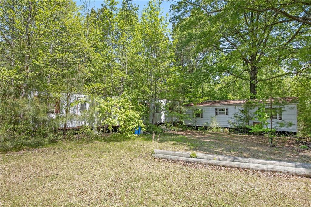 340 Sally Blackwell Road Pageland, SC 29728 - Photo 27 of 30 a view of a house with a yard