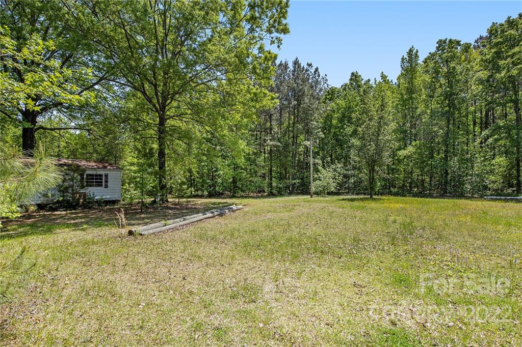 340 Sally Blackwell Road Pageland, SC 29728 - Photo 29 of 30 a swimming pool with an outdoor space