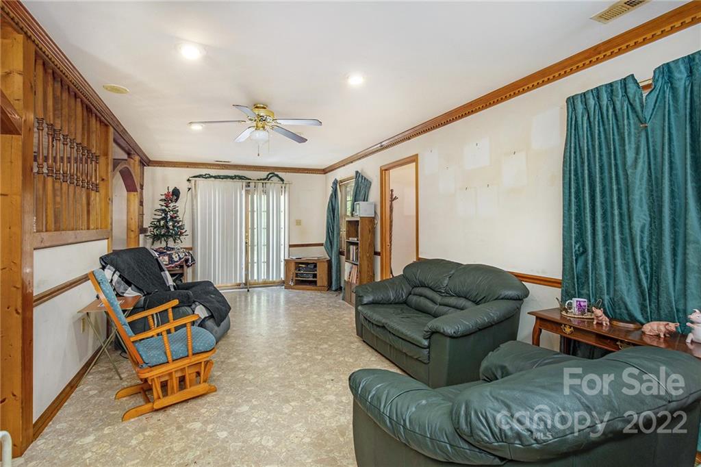 340 Sally Blackwell Road Pageland, SC 29728 - Photo 7 of 30 a living room with furniture and a flat screen tv