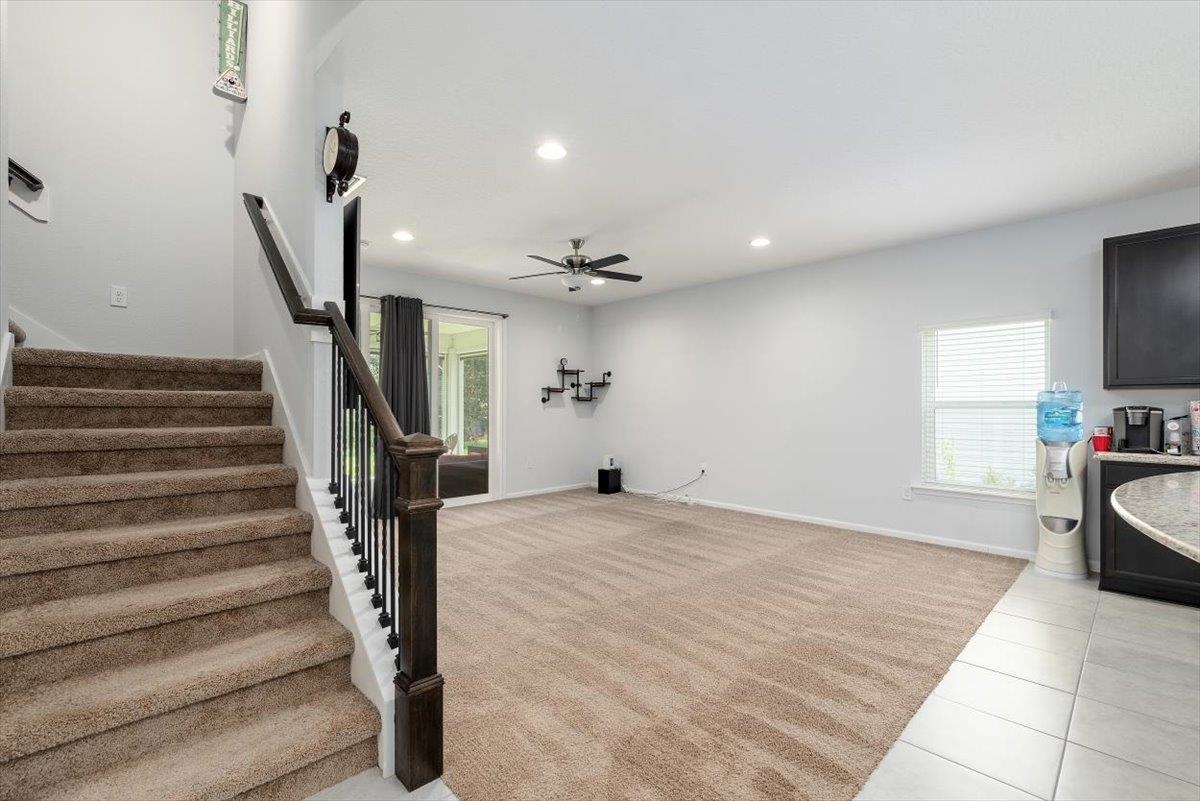 668 Watervale Drive St. Augustine, FL 32092 - Photo 4 of 17 a view of a livingroom with furniture and staircase