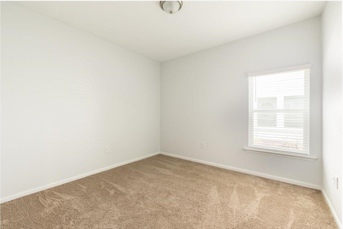 668 Watervale Drive St. Augustine, FL 32092 - Photo 10 of 17 an empty room with a window