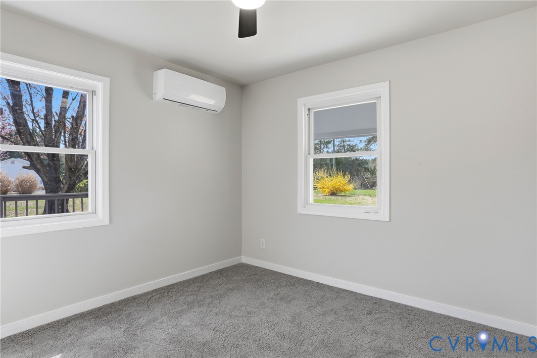 3490 Willow Brook Road Bumpass, VA 23024 - Photo 19 of 29 an empty room with windows