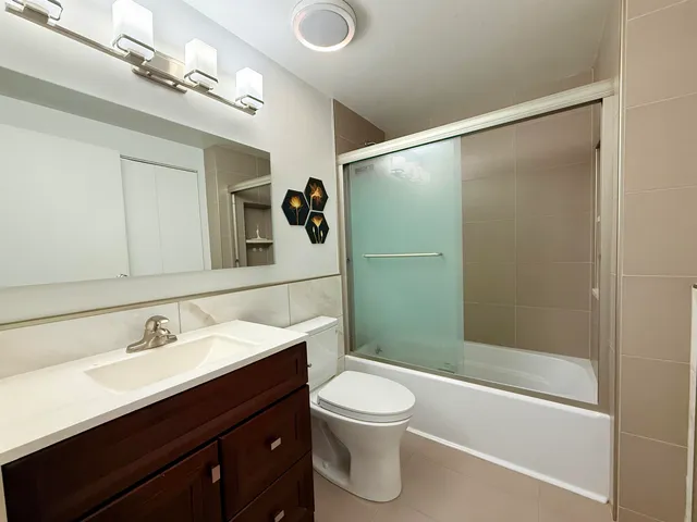 a view of a storage & utility room with washer and dryer