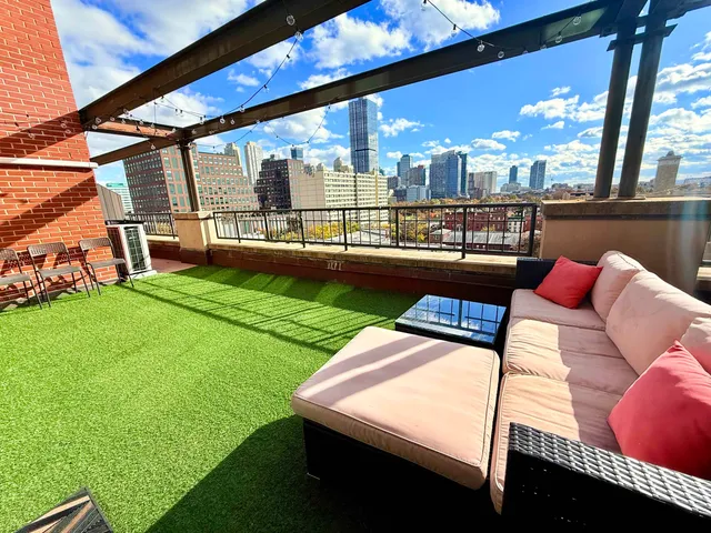 a view of swimming pool with a yard