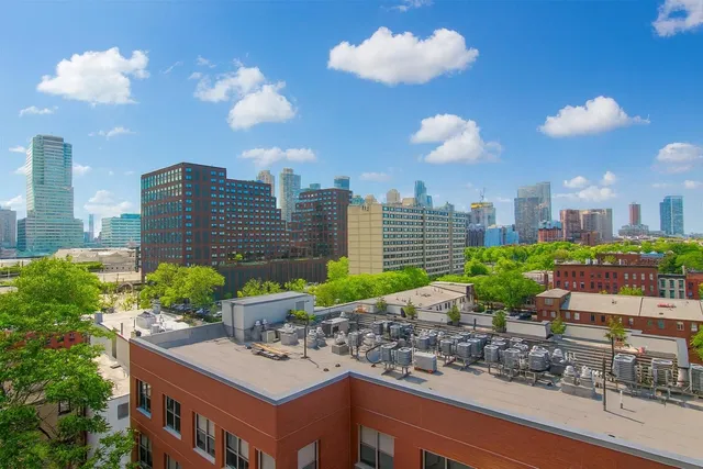 a city view with tall buildings