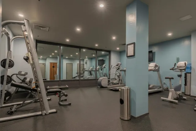 a bathroom with a tub and shower