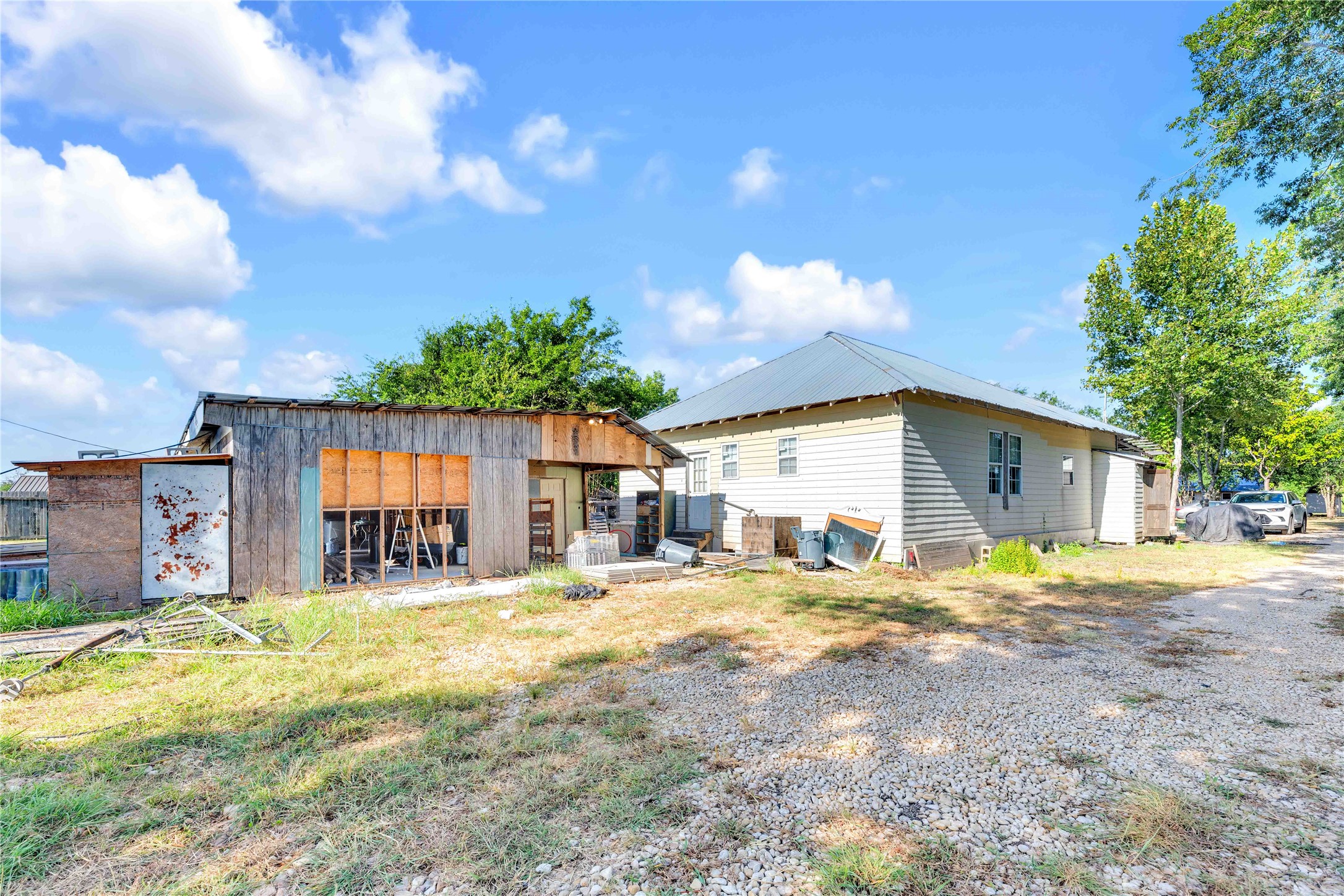 20235 Engelmann Lane Manor, TX 78653 - Photo 31 of 34 Back of rear house with an outbuilding