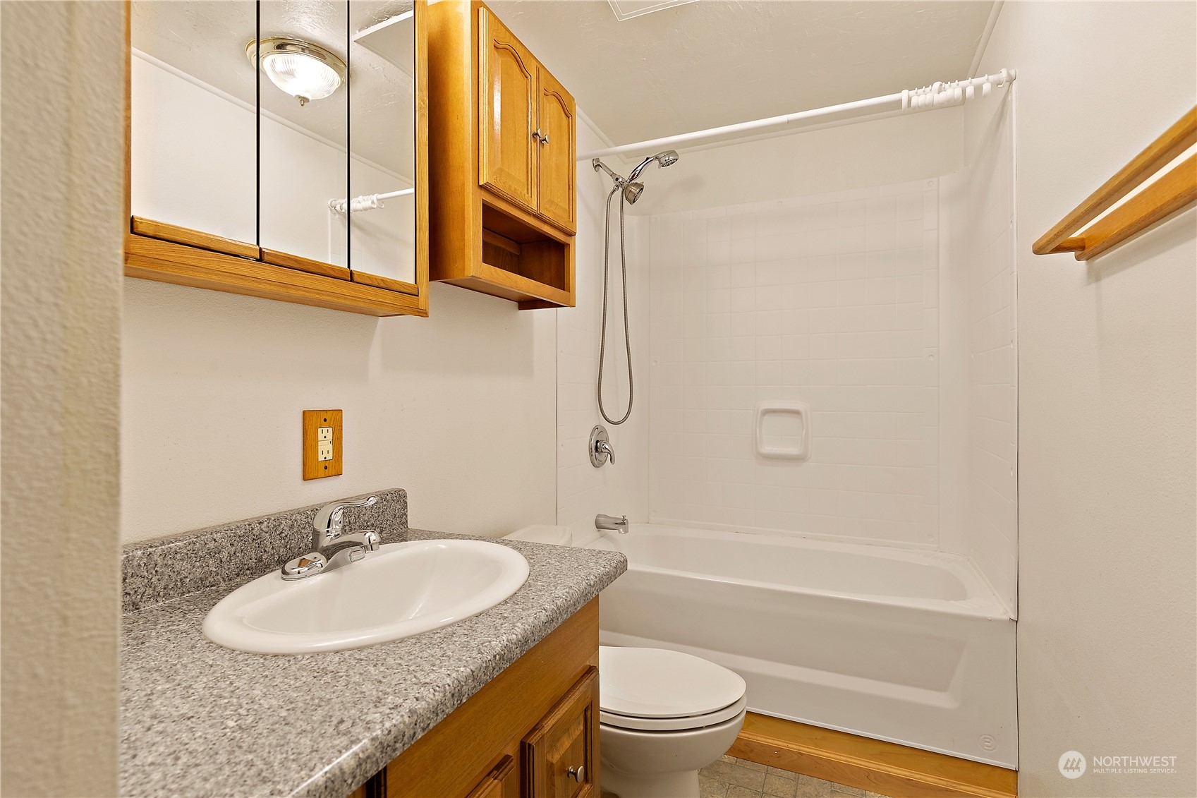 18124 Wakly Lane Southwest Rochester, WA 98579 - Photo 22 of 30 a bathroom with a sink toilet and shower