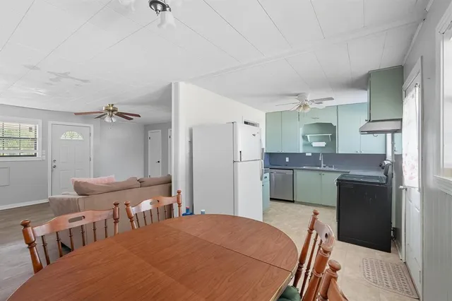 a bedroom with furniture and a chandelier
