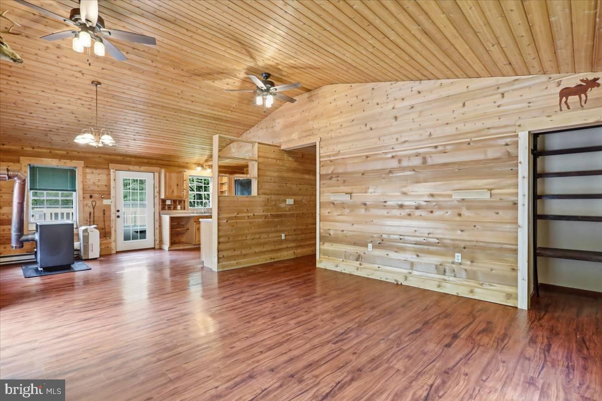 24105 Raven Rock Road Smithsburg, MD 21783 - Photo 11 of 51 Cozy cabin with warm wooden accents.