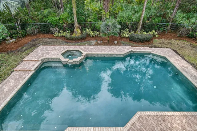 a front view of house with yard and outdoor seating