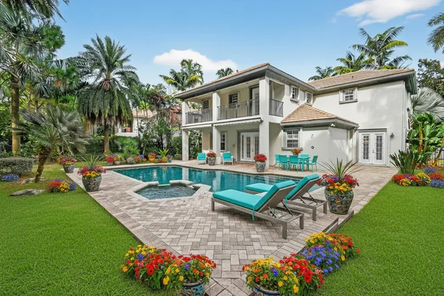 a garden view with a seating space