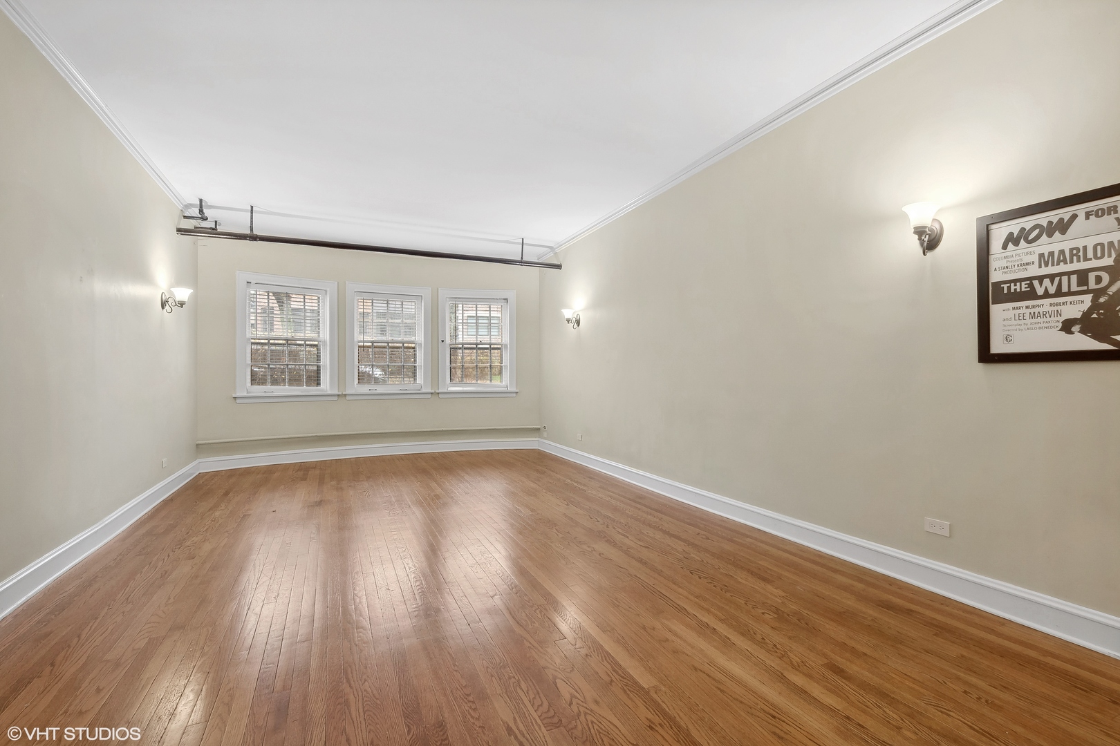 498 Sheridan Road, Unit G Evanston, IL 60202 - Photo 7 of 13 wooden floor in an empty room with a window