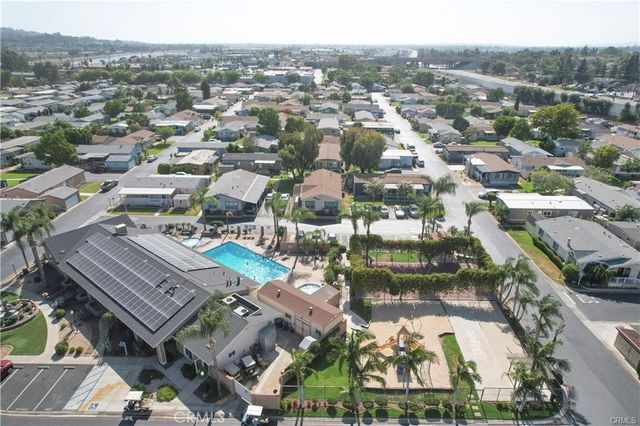 an aerial view of a city with lots of residential buildings