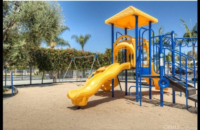 a view of a park with slide