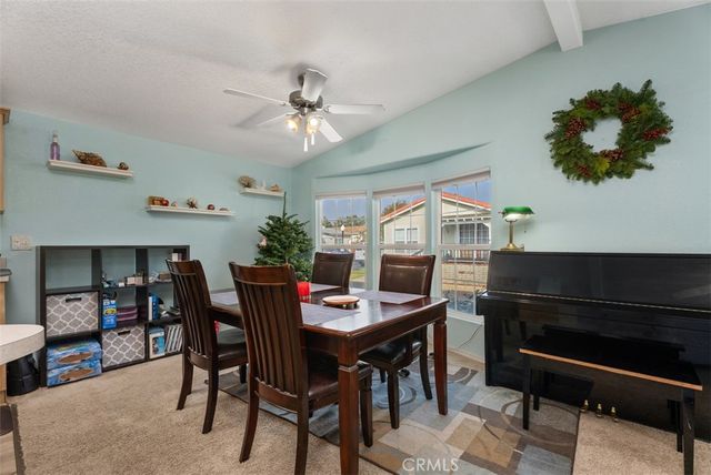 a view of a dining room with furniture