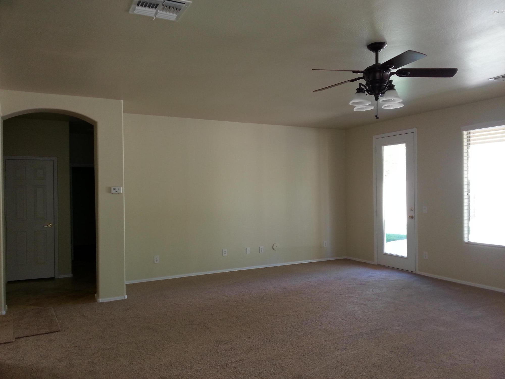 3334 East Blue Ridge Way Gilbert, AZ 85298 - Photo 29 of 67 huge wall for tv in fr