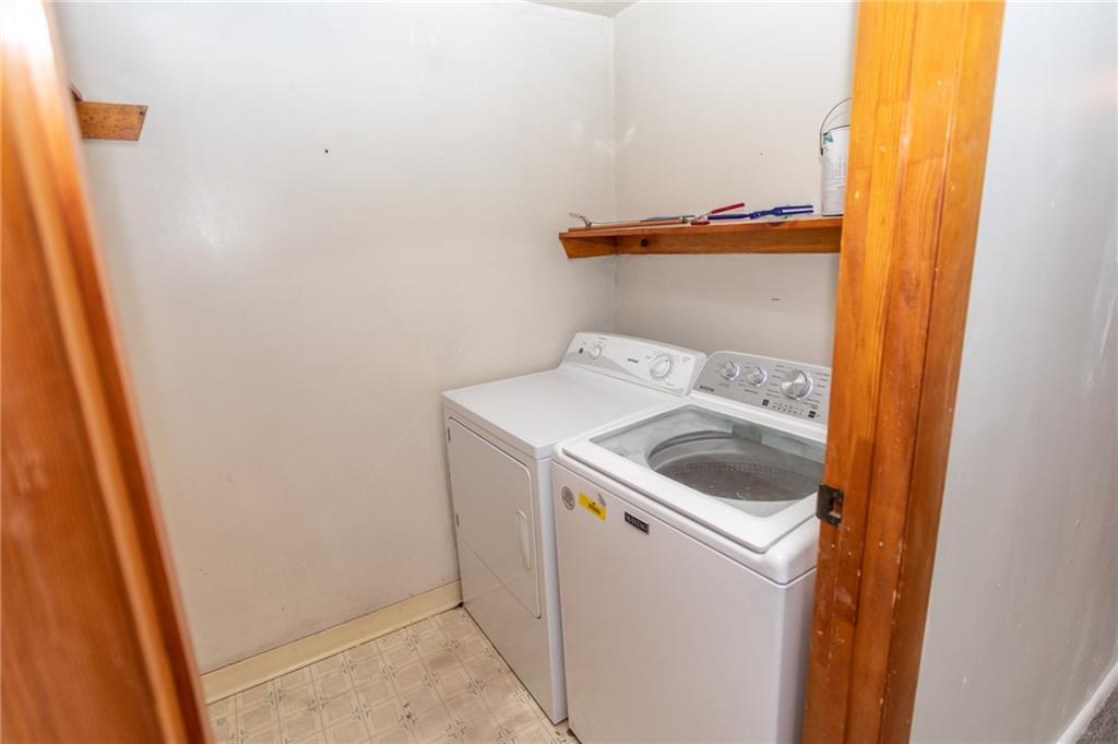 105 Jones Street Everson, PA 15631 - Photo 16 of 17 a utility room with dryer and washer