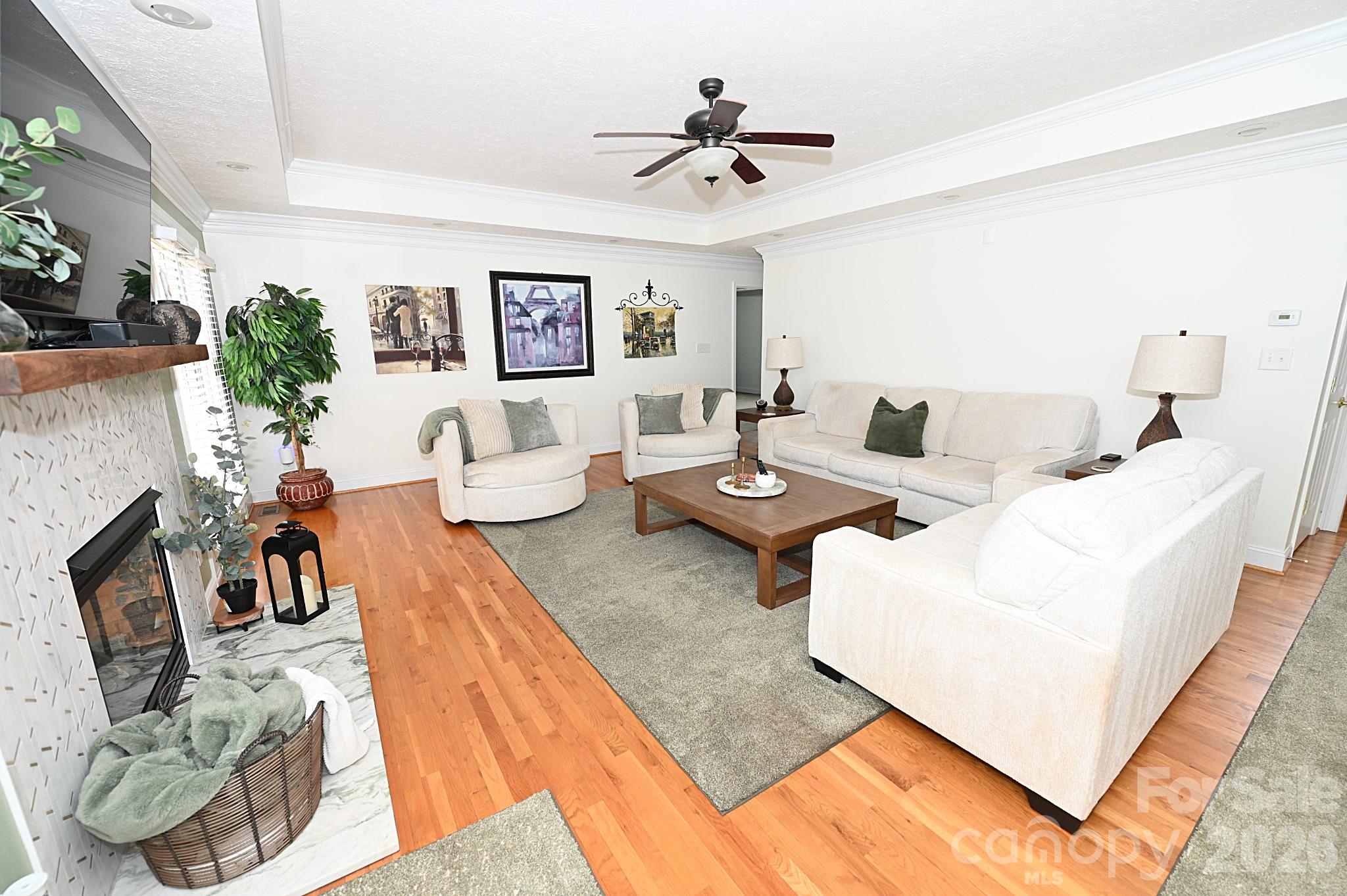 406 5th Avenue Northeast Conover, NC 28613 - Photo 11 of 46 a living room with furniture and a rug