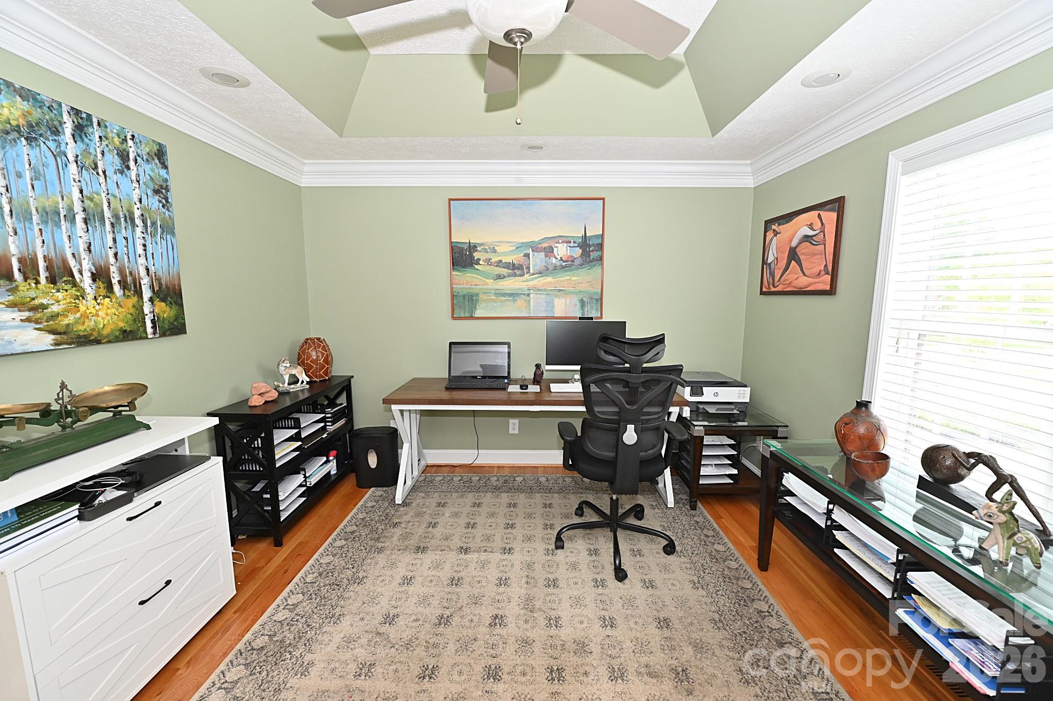 406 5th Avenue Northeast Conover, NC 28613 - Photo 12 of 46 a view of a workspace with furniture and a window