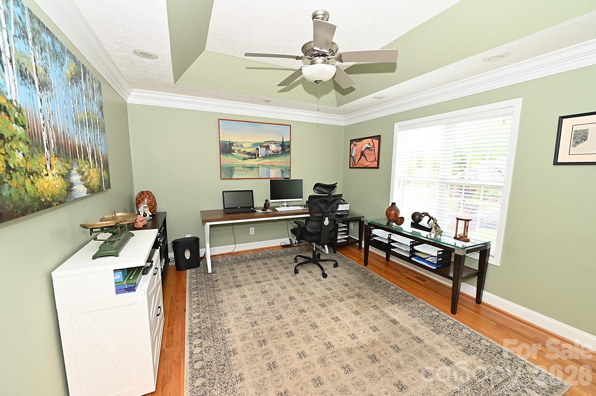 406 5th Avenue Northeast Conover, NC 28613 - Photo 13 of 46 a view of a workspace with furniture and a window