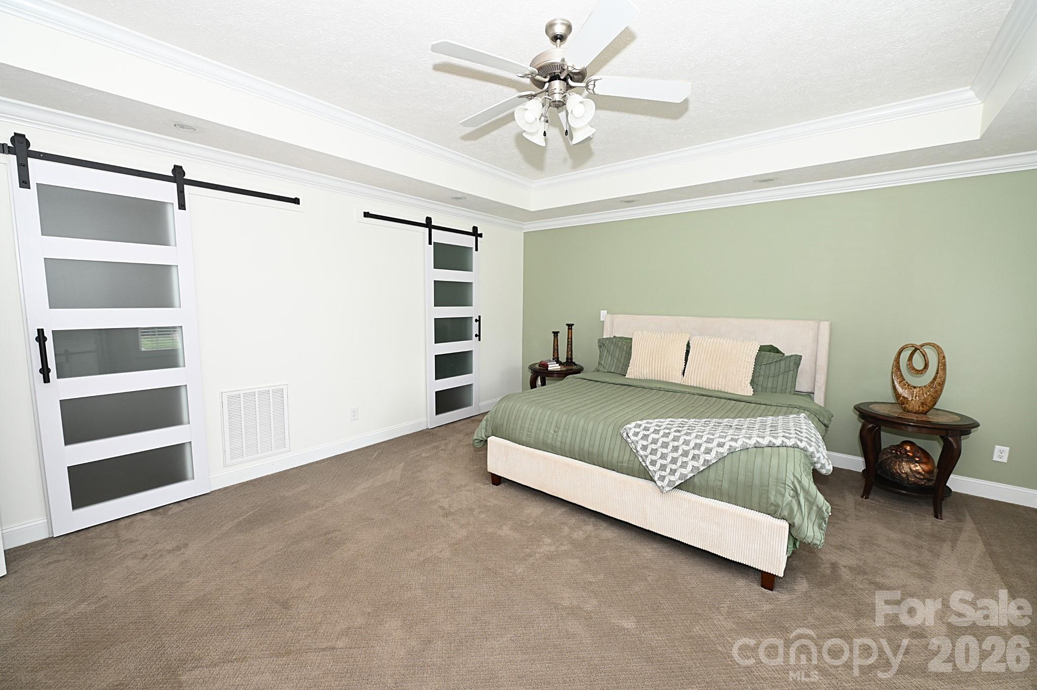 406 5th Avenue Northeast Conover, NC 28613 - Photo 23 of 46 a bedroom with a bed and closet