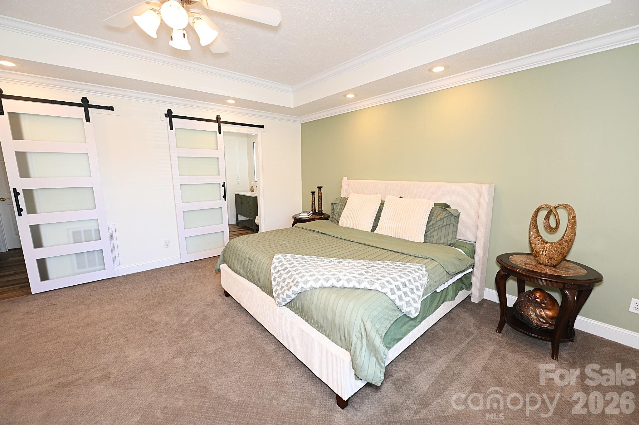 406 5th Avenue Northeast Conover, NC 28613 - Photo 24 of 46 a bedroom with a bed and cabinets