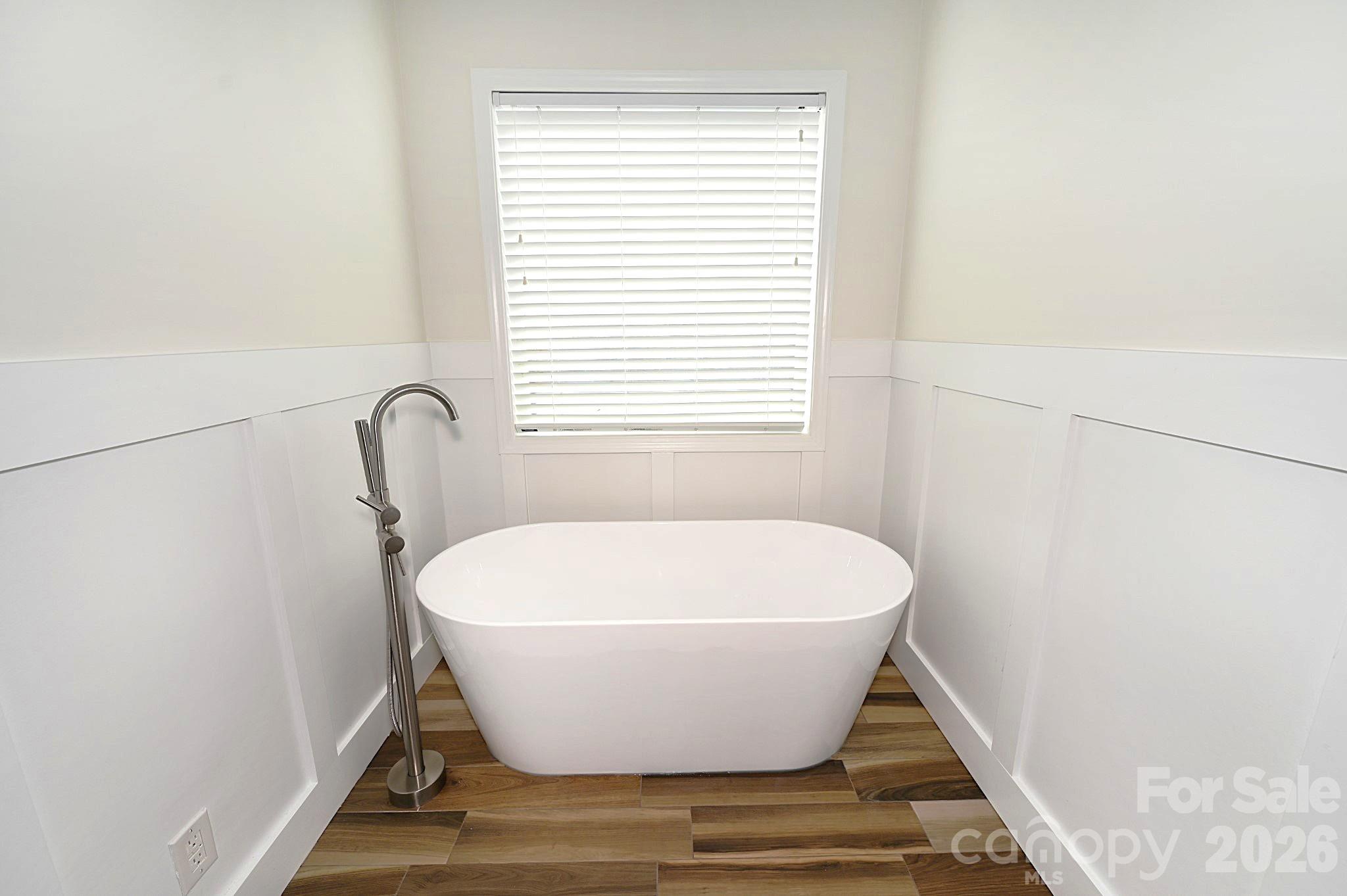 406 5th Avenue Northeast Conover, NC 28613 - Photo 25 of 46 a white tub sitting in a bathroom