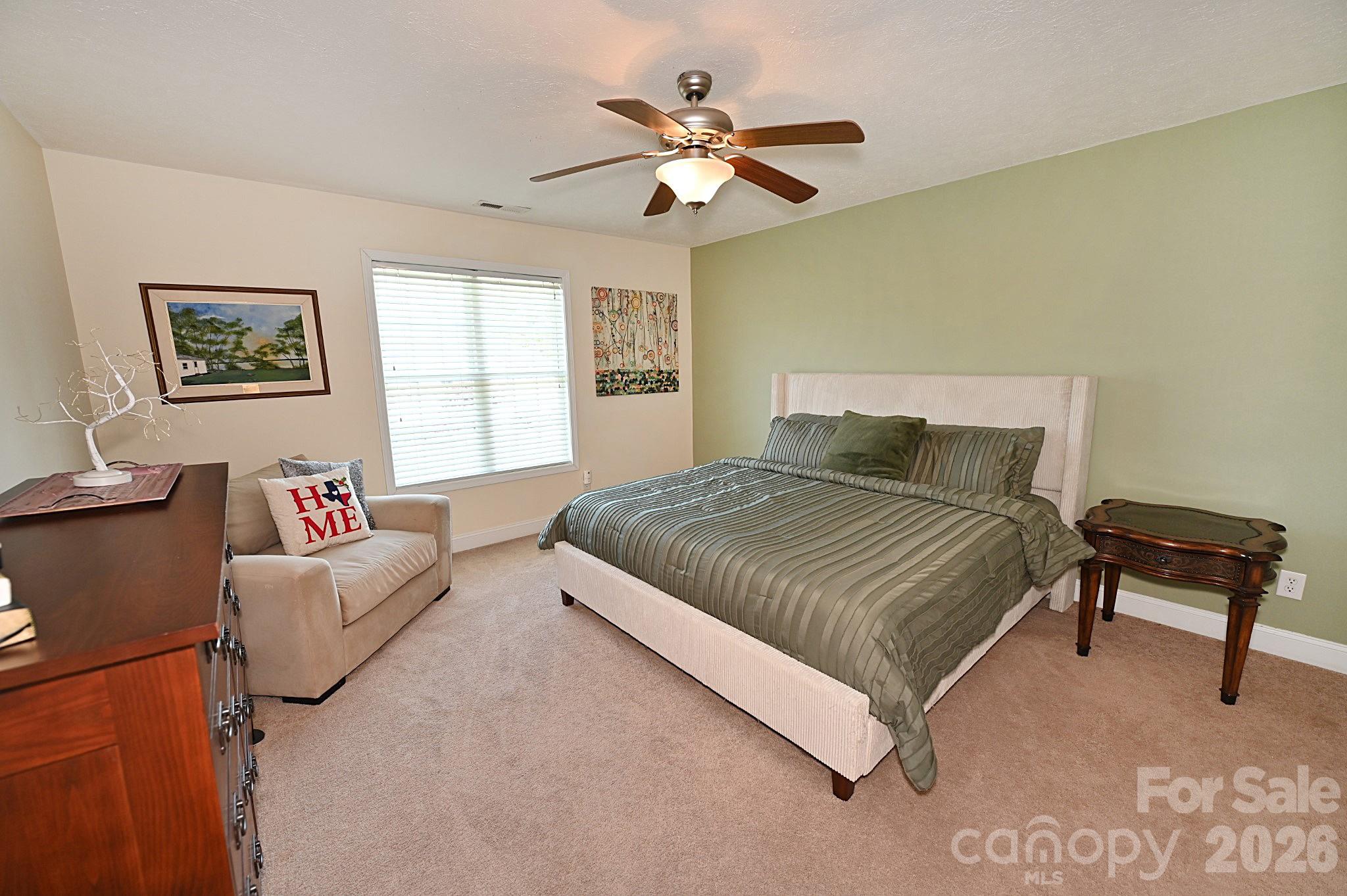 406 5th Avenue Northeast Conover, NC 28613 - Photo 34 of 46 a bedroom with a bed and a couch