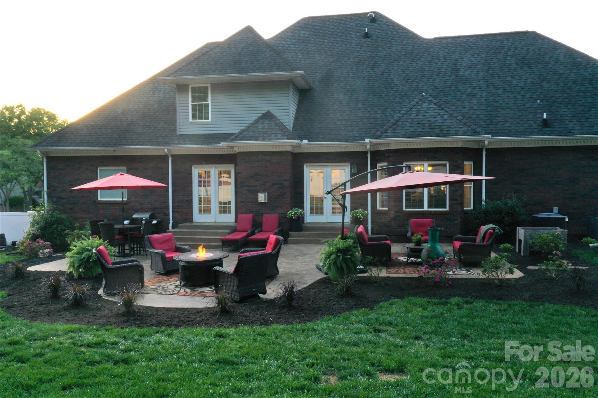 406 5th Avenue Northeast Conover, NC 28613 - Photo 41 of 46 a group of people sitting in front of a house