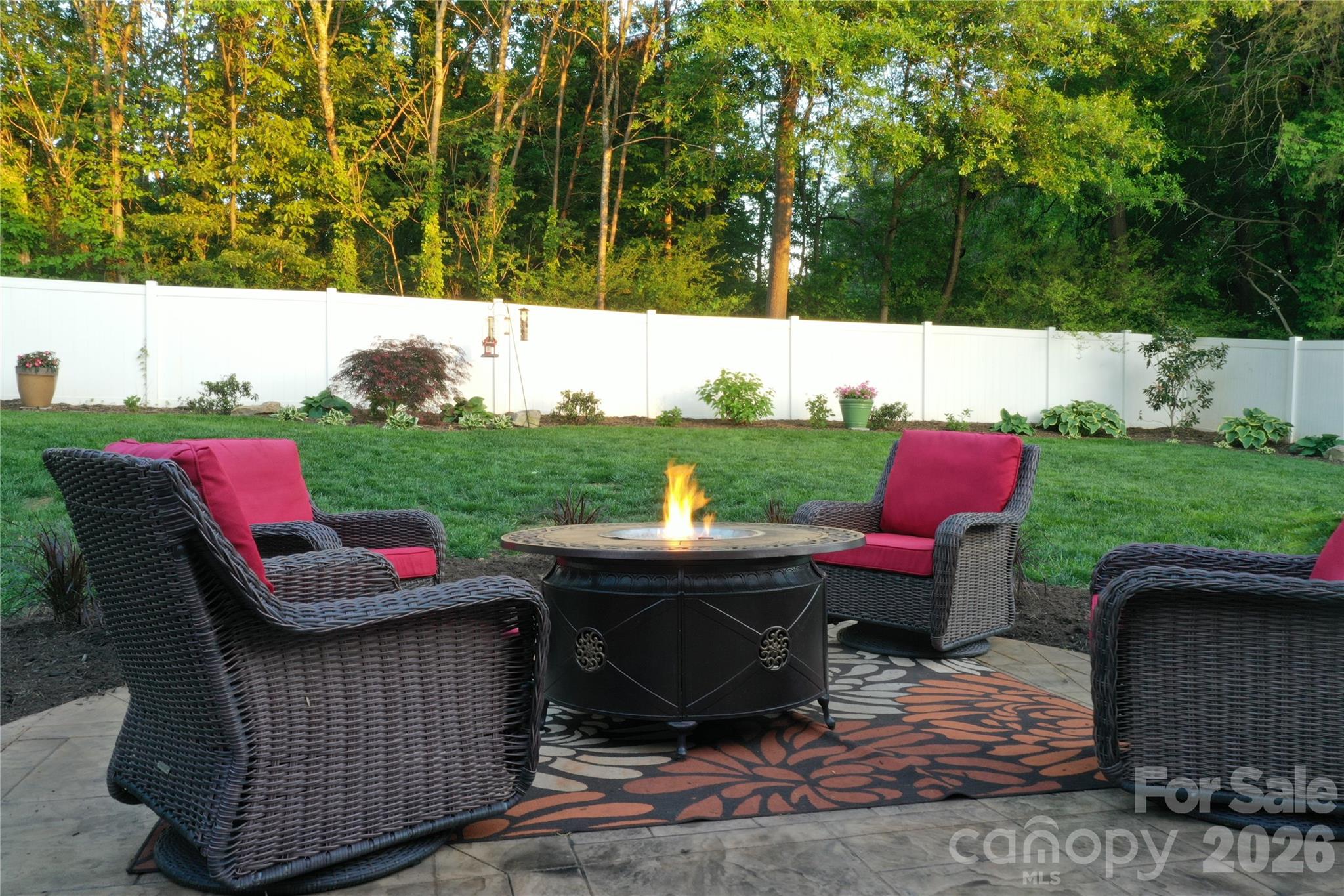 406 5th Avenue Northeast Conover, NC 28613 - Photo 44 of 46 a view of a patio with a table and chairs