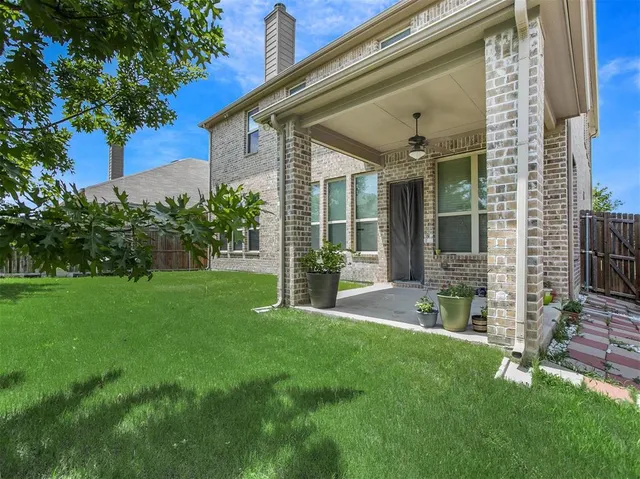 a view of a porch with a yard
