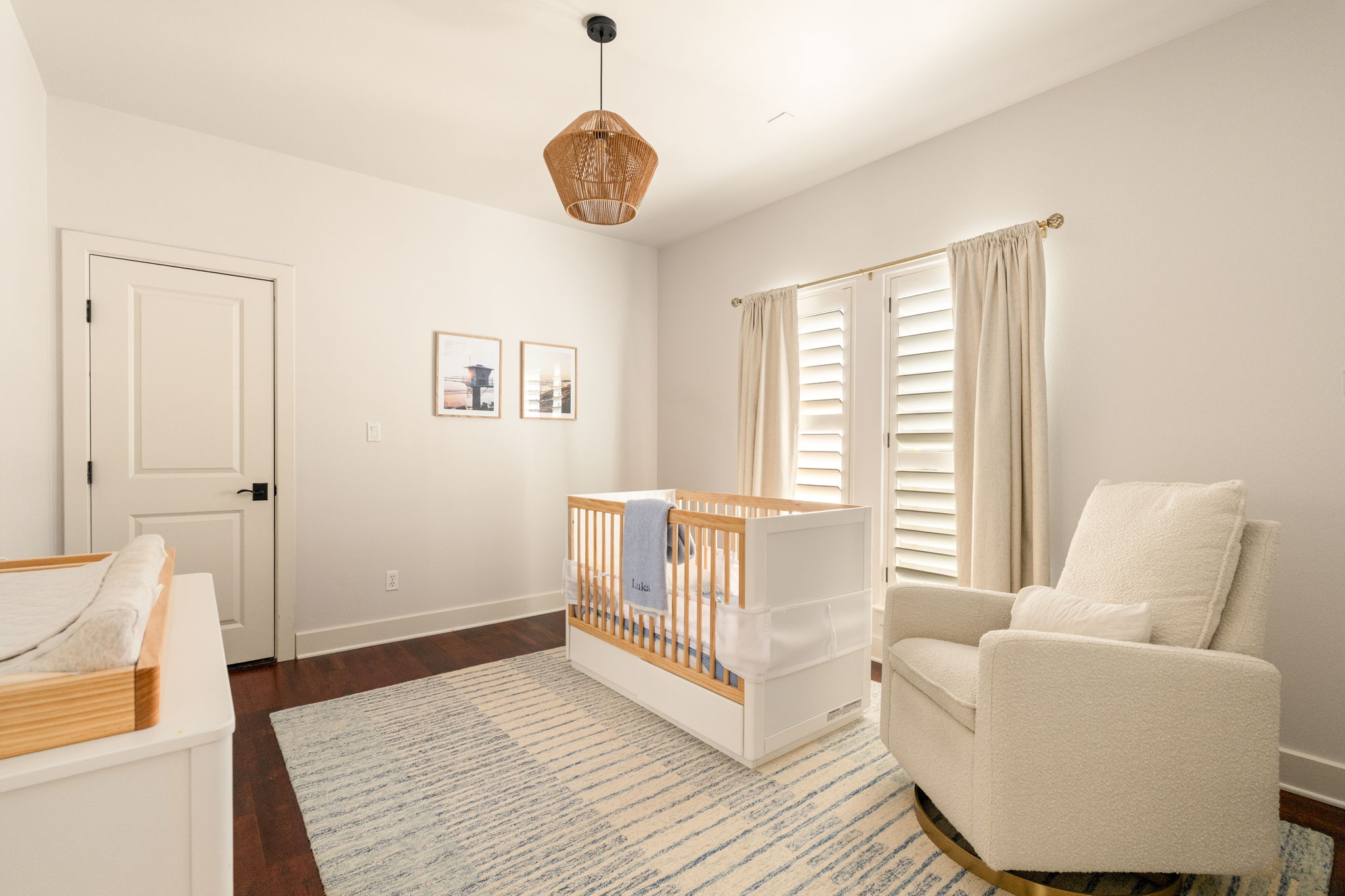 2324 Kinney Road Austin, TX 78704 - Photo 24 of 35 Rich hardwood flooring pairs with clean lines and classic plantation shutters in this serene space.