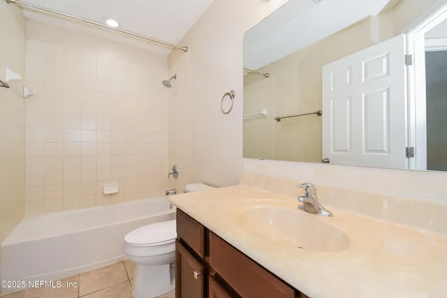 a bathroom with a sink toilet a shower and a bathtub