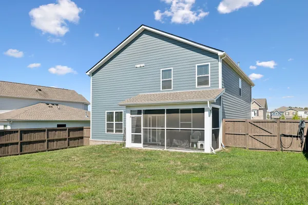 a house view with a garden space