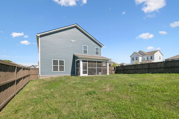 a house view with a outdoor space